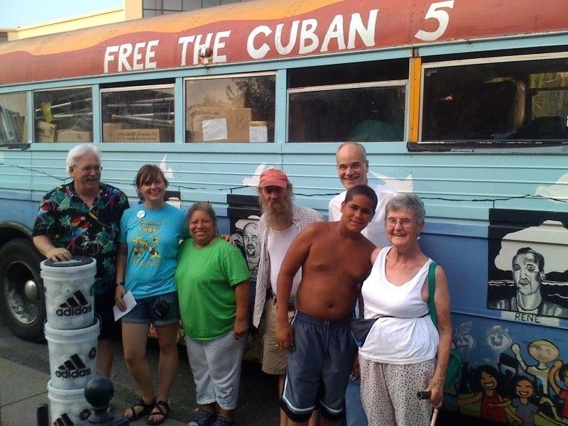 Loading the Pastors for Peace bus, bound for Cuba. The bus, parked on Wethersfield Avenue, picked up humanitarian aid including buckets of baseballs.